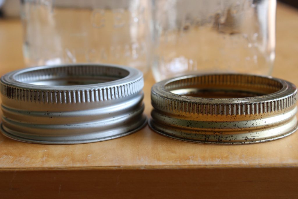 A comparison photo of an antique 78mm screw band to use with glass lids and a modern 78mm ring for use with metal lids on antique Gem, Jewel, and Crown canning jars.